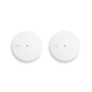 Two round, white Ring glass break sensors for home security.