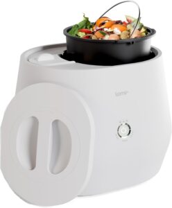 Lomi smart composting device with a bucket of food scraps ready for composting.