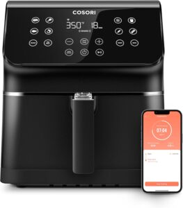 Smart air fryer with touchscreen controls and a connected smartphone app showing cooking progress.