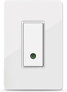 White smart light switch with a green power button symbol in the center.