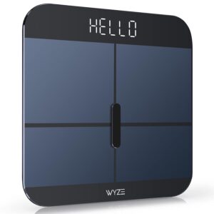 Wyze Smart Scale showing a digital display with the word 'Hello' on a sleek black design.